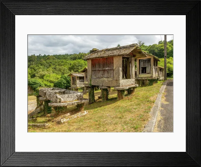 Framed Print : Derelict abandoned old granary grain stores (horreos) in village of Rubillon, Ourense province, Galicia, Spain, Europe