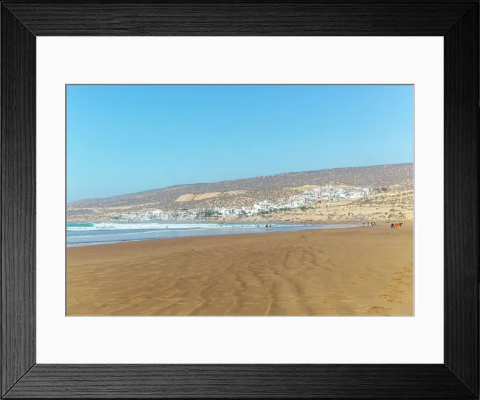 Framed Print : People walking along sandy beach at low tide near village of Taghazout, Morocco, North Africa, Africa Framed Print : People walking along sandy beach at low tide near village of Taghazout, Morocco, North Africa, Africa