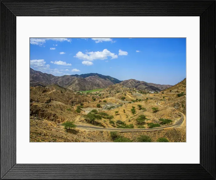 Framed Print : Railway track snaking through the mountains along the road from Massawa to Asmara, Eritrea, Africa Framed Print : Railway track snaking through the mountains along the road from Massawa to Asmara, Eritrea, Africa