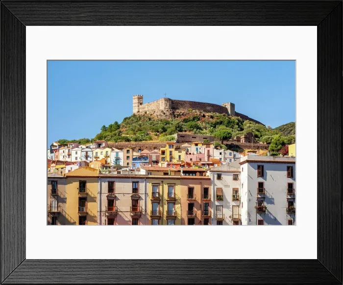 Framed Print : Bosa city colorful buildings with castle on top of the hill and Vecchio bridge crossing Temo river, Bosa, Sardinia, Italy, Mediterranean, Europe Framed Print : Bosa city colorful buildings with castle on top of the hill and Vecchio bridge crossing Temo river, Bosa, Sardinia, Italy, Mediterranean, Europe