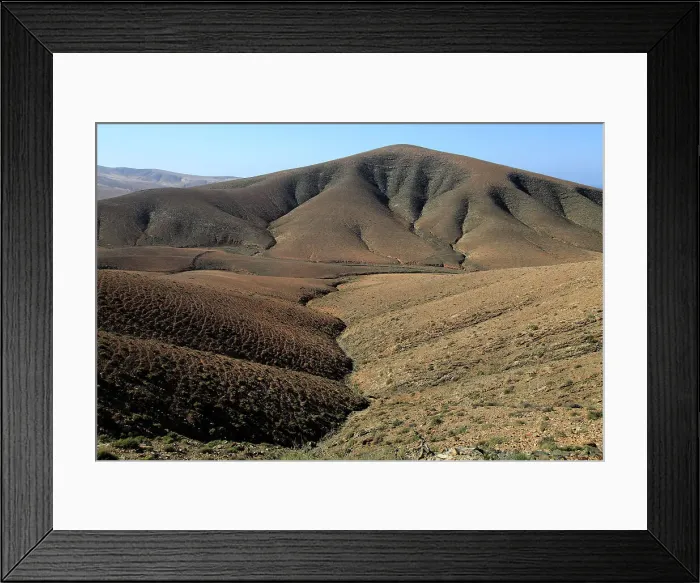 Framed Print : Bare moon-like arid landscape in mountains between Pajara and La Pared, Fuerteventura, Canary Islands, Spain, Atlantic, Europe Framed Print : Bare moon-like arid landscape in mountains between Pajara and La Pared, Fuerteventura, Canary Islands, Spain, Atlantic, Europe