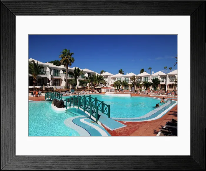 Framed Print : Swimming pool at H10 Ocean Suites hotel in Corralejo, Fuerteventura, Canary Islands, Spain, Atlantic, Europe Framed Print : Swimming pool at H10 Ocean Suites hotel in Corralejo, Fuerteventura, Canary Islands, Spain, Atlantic, Europe