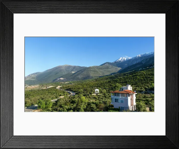 Framed Print : Snow capped peak of Mount Cika and mountain road over Llogara Pass, Palase, near Dhermi, Albania, Europe Framed Print : Snow capped peak of Mount Cika and mountain road over Llogara Pass, Palase, near Dhermi, Albania, Europe