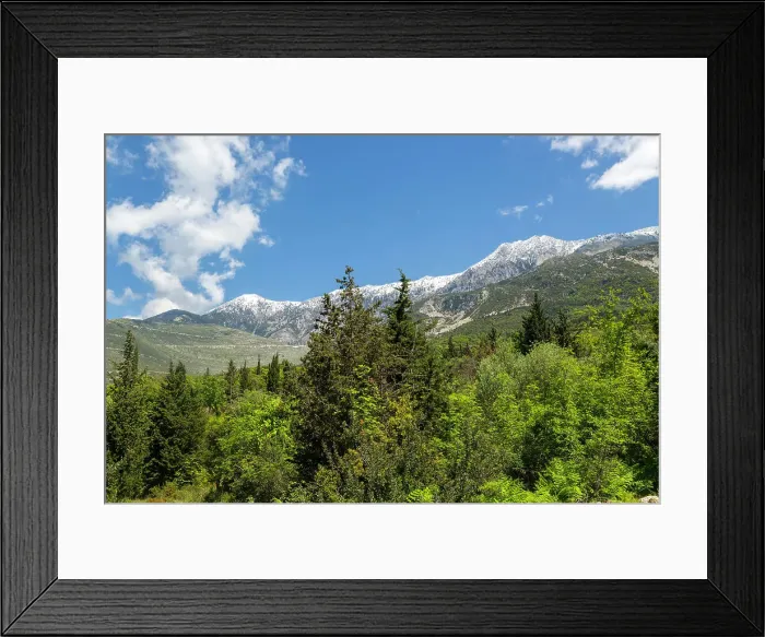 Framed Print : Snow capped peak of Mount Cika viewed through hillside forest trees, near Dhermi, Albania, Europe Framed Print : Snow capped peak of Mount Cika viewed through hillside forest trees, near Dhermi, Albania, Europe