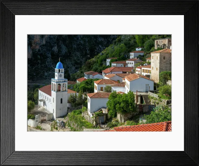 Framed Print : View over houses and rooftops to Greek Orthodox Church of Saint Spyridon, village of Dhermi, Albania, Europe Framed Print : View over houses and rooftops to Greek Orthodox Church of Saint Spyridon, village of Dhermi, Albania, Europe