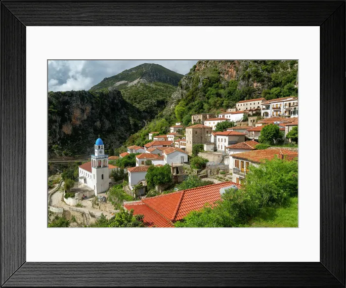 Framed Print : View over houses and rooftops to Greek Orthodox Church of Saint Spyridon, village of Dhermi, Albania, Europe Framed Print : View over houses and rooftops to Greek Orthodox Church of Saint Spyridon, village of Dhermi, Albania, Europe