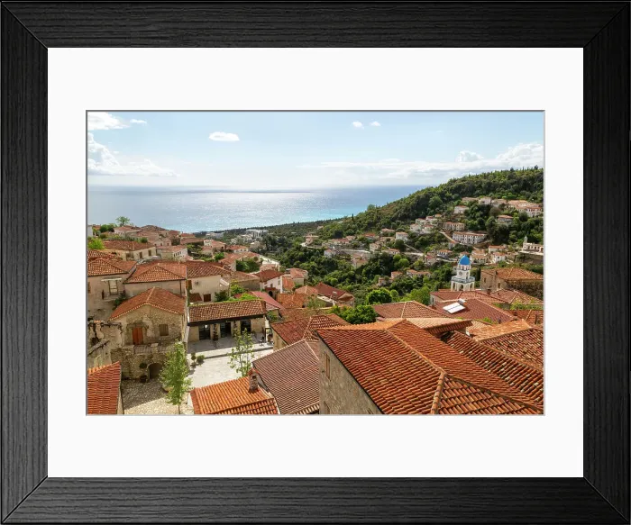 Framed Print : View to Ionian Sea over houses and rooftops with Greek Orthodox Church of Saint Spyridon, village of Dhermi, Albania, Europe Framed Print : View to Ionian Sea over houses and rooftops with Greek Orthodox Church of Saint Spyridon, village of Dhermi, Albania, Europe