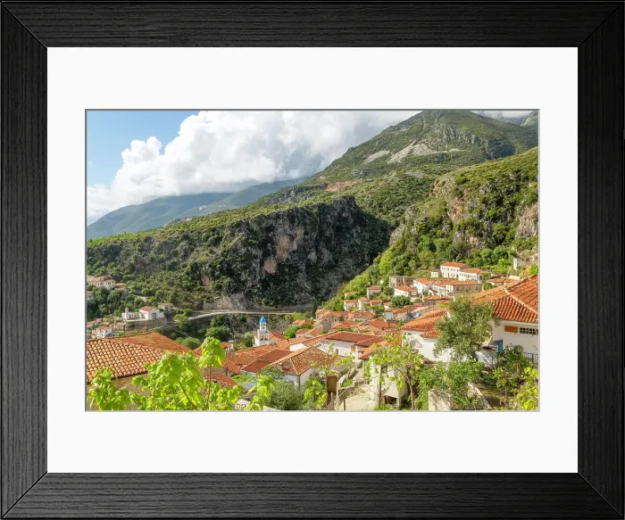 Framed Print : View over houses and rooftops to Greek Orthodox Church of Saint Spyridon, village of Dhermi, Albania, Europe Framed Print : View over houses and rooftops to Greek Orthodox Church of Saint Spyridon, village of Dhermi, Albania, Europe