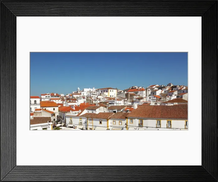 Framed Print : Panoramic cityscape view over pan tile rooftops and whitewashed buildings in the city centre of Evora, Alto Alentejo, Portugal, Europe Framed Print : Panoramic cityscape view over pan tile rooftops and whitewashed buildings in the city centre of Evora, Alto Alentejo, Portugal, Europe