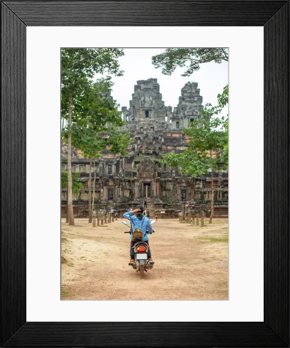 Framed Print : A unidentifed woman riding a scooter towards Banteay Kdei temple in Angkor complex, UNESCO World Heritage Site, Cambodia, Indochina, Southeast Asia, Asia