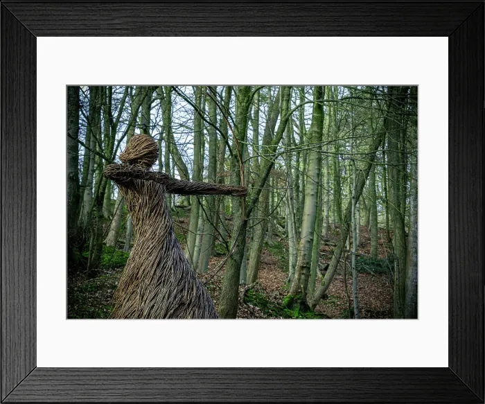 Framed Print : Straw sculpture of a humanoid figure in a forest, with arms outstretched amidst bare trees, Skipton, Yorkshire, England, United Kingdom, Europe Framed Print : Straw sculpture of a humanoid figure in a forest, with arms outstretched amidst bare trees, Skipton, Yorkshire, England, United Kingdom, Europe