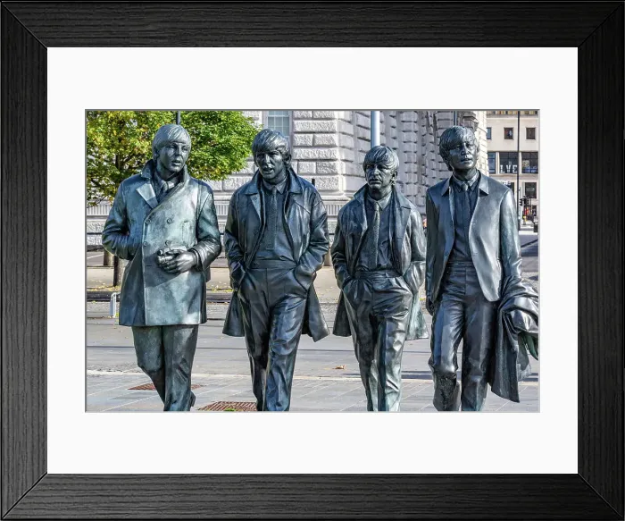 Framed Print : Bronze statues of the four members of a famous band, The Beatles, walking in line on a city street, with buildings in the background in Liverpool, Merseyside, England, United Kingdom, Europe Framed Print : Bronze statues of the four members of a famous band, The Beatles, walking in line on a city street, with buildings in the background in Liverpool, Merseyside, England, United Kingdom, Europe
