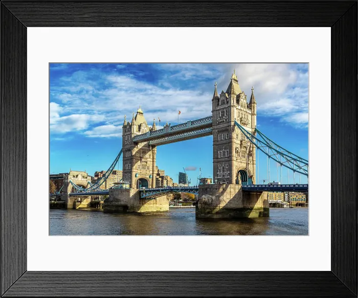 Framed Print : Sunny day view of the iconic Tower Bridge over the River Thames, with blue skies and fluffy clouds, London, England, United Kingdom, Europe Framed Print : Sunny day view of the iconic Tower Bridge over the River Thames, with blue skies and fluffy clouds, London, England, United Kingdom, Europe