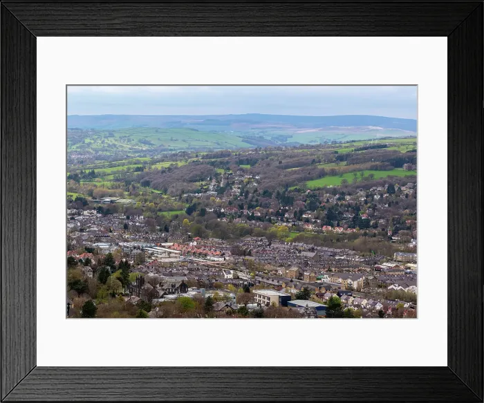 Framed Print : Aerial view of a quaint town nestled in a lush valley with rolling hills in the background in Ilkley, North Yorkshire, England, United Kingdom, Europe Framed Print : Aerial view of a quaint town nestled in a lush valley with rolling hills in the background in Ilkley, North Yorkshire, England, United Kingdom, Europe