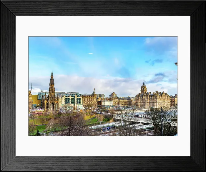 Framed Print : Panoramic view of a historic cityscape with a prominent monument and classical architecture under a blue sky with clouds, Edinburgh, Scotland, United Kingdom, Europe Framed Print : Panoramic view of a historic cityscape with a prominent monument and classical architecture under a blue sky with clouds, Edinburgh, Scotland, United Kingdom, Europe