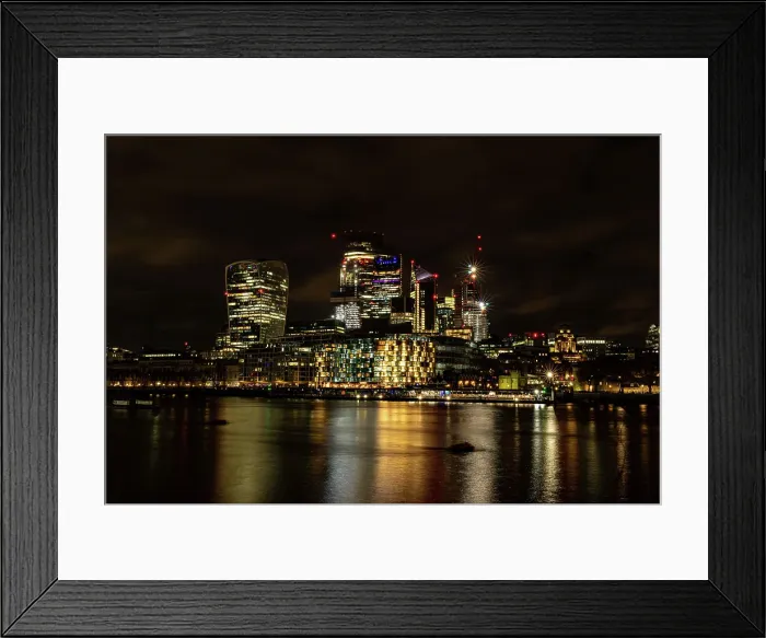 Framed Print : Night time cityscape with illuminated skyscrapers and reflections on water, City of London, England, United Kingdom, Europe Framed Print : Night time cityscape with illuminated skyscrapers and reflections on water, City of London, England, United Kingdom, Europe