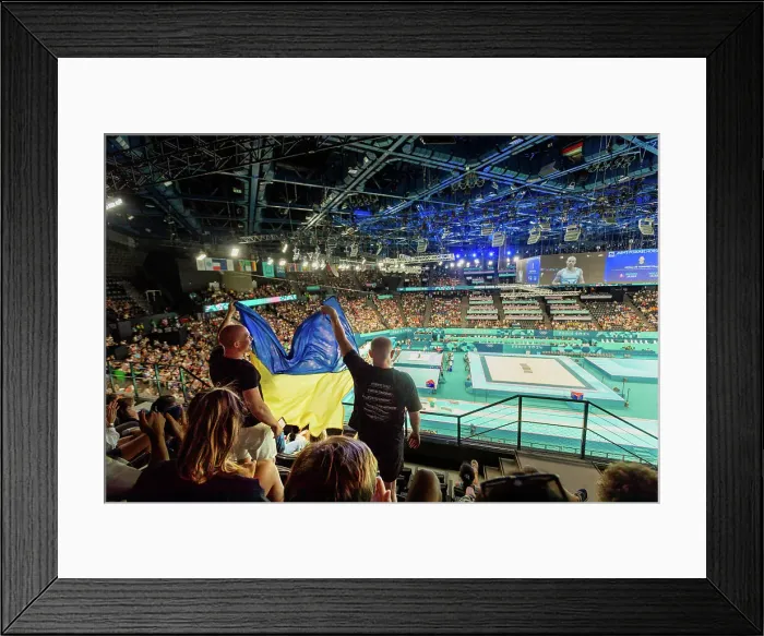 Framed Print : Patriotic Ukrainian men cheering on men's gymnastics at the Paris 2024 Olympics, Bercy Arena, Paris, France, Europe Framed Print : Patriotic Ukrainian men cheering on men's gymnastics at the Paris 2024 Olympics, Bercy Arena, Paris, France, Europe