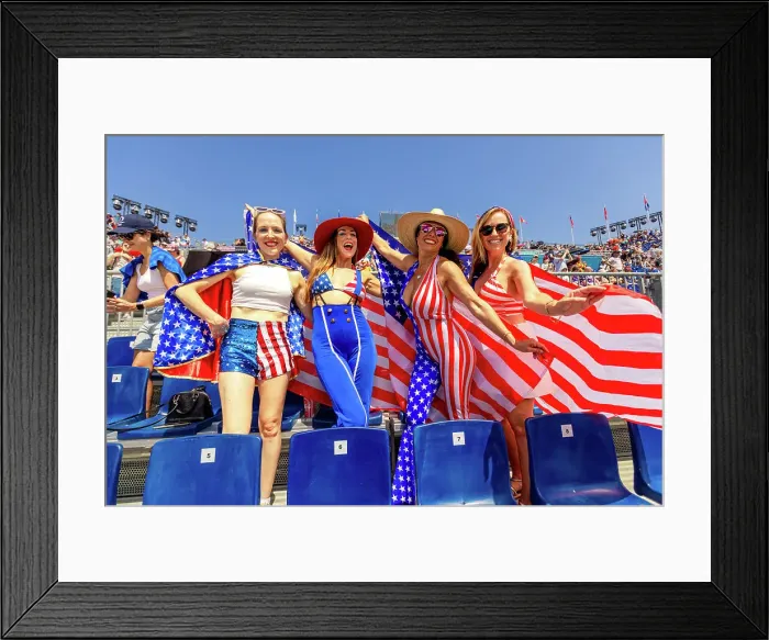 Framed Print : Patriotic American Woman jumping and cheering for Team USA and the Paris 2024 Olympics in front of the Eiffel Tower beach volleyball stadium, Paris, France, Europe Framed Print : Patriotic American Woman jumping and cheering for Team USA and the Paris 2024 Olympics in front of the Eiffel Tower beach volleyball stadium, Paris, France, Europe