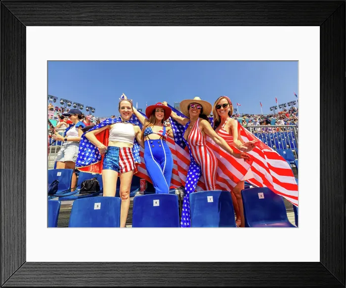 Framed Print : Patriotic American Woman jumping and cheering for Team USA and the Paris 2024 Olympics in front of the Eiffel Tower beach volleyball stadium, Paris, France, Europe