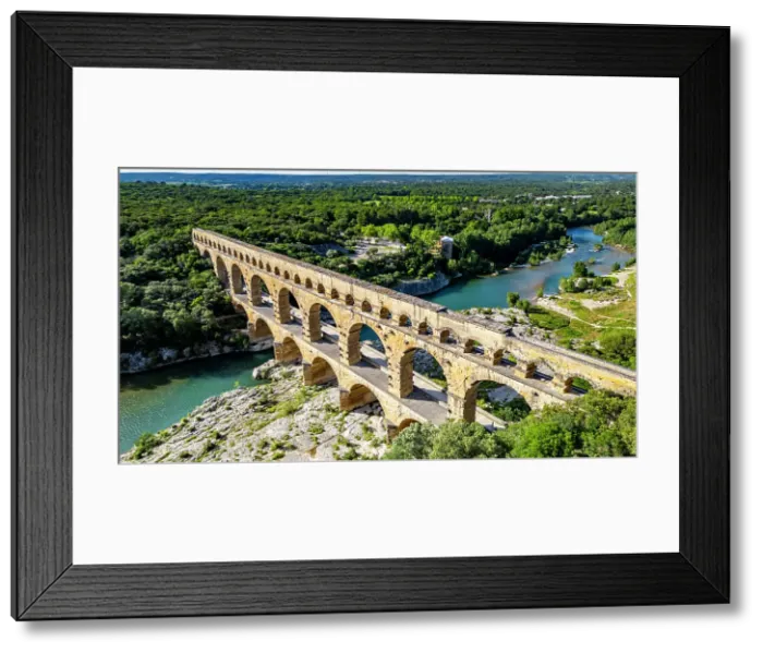 Framed Print : The Pont du Gard, a Roman aqueduct, UNESCO World Heritage Site, Vers-Pont-du-Guard, Occitanie, France, Europe Framed Print : The Pont du Gard, a Roman aqueduct, UNESCO World Heritage Site, Vers-Pont-du-Guard, Occitanie, France, Europe