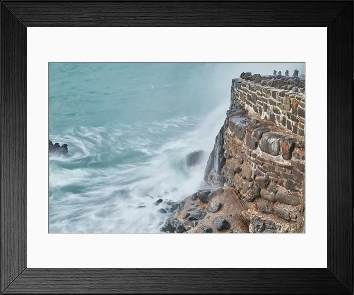 Framed Print : Evening shoreline, Atlantic surf crashing against the harbour wall at Hartland Quay, north Devon, England, United Kingdom, Europe