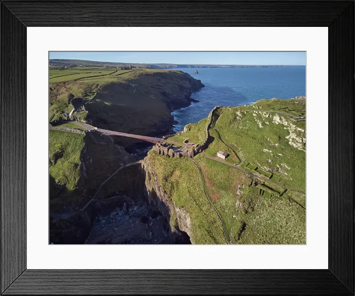 Framed Print : An aerial view of the dramatic ruins of Tintagel Castle, said to be the birthplace of King Arthur, on a rocky island off the shore, near the town of Tintagel, Cornwall, England, United Kingdom, Europe Framed Print : An aerial view of the dramatic ruins of Tintagel Castle, said to be the birthplace of King Arthur, on a rocky island off the shore, near the town of Tintagel, Cornwall, England, United Kingdom, Europe