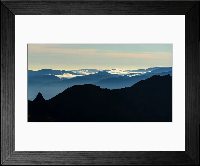 Framed Print : Silhouette volcanic landscape in front of blue mountain slopes, North Island, New Zealand, Pacific Framed Print : Silhouette volcanic landscape in front of blue mountain slopes, North Island, New Zealand, Pacific