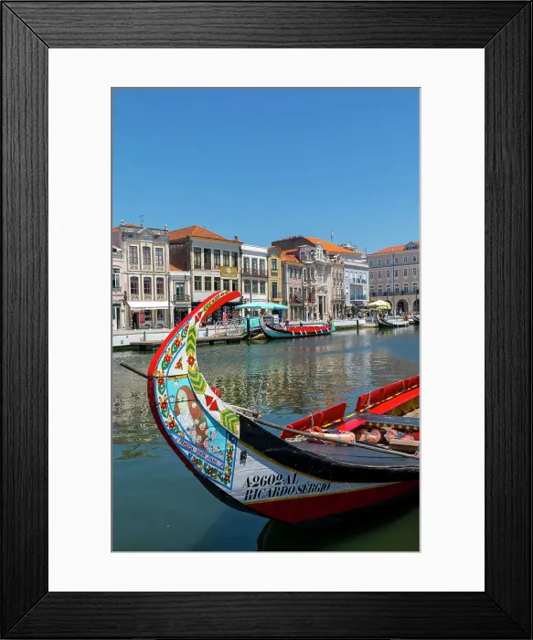 Framed Print : A Moliceiro with Traditional Art Nouveau architecture, Aveiro, Centro, Portugal, Europe Framed Print : A Moliceiro with Traditional Art Nouveau architecture, Aveiro, Centro, Portugal, Europe