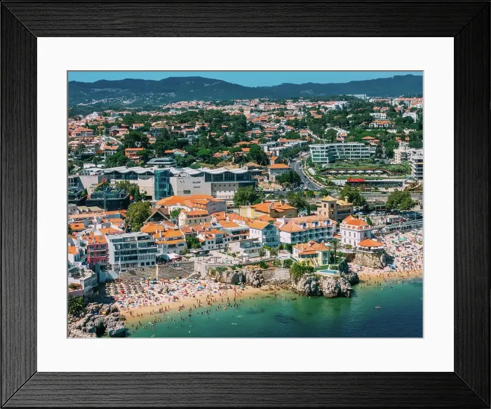 Framed Print : Aerial view of Cascais beaches and colourful rooftops of coastal town under bright sunlight with Sintra mountains in the background, Cascais, Portugal, Europe