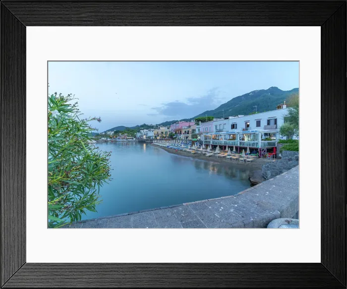 Framed Print : View of beach and the town of Lacco Ameno at sunset, Island of Ischia, Campania, Italy, Europe Framed Print : View of beach and the town of Lacco Ameno at sunset, Island of Ischia, Campania, Italy, Europe