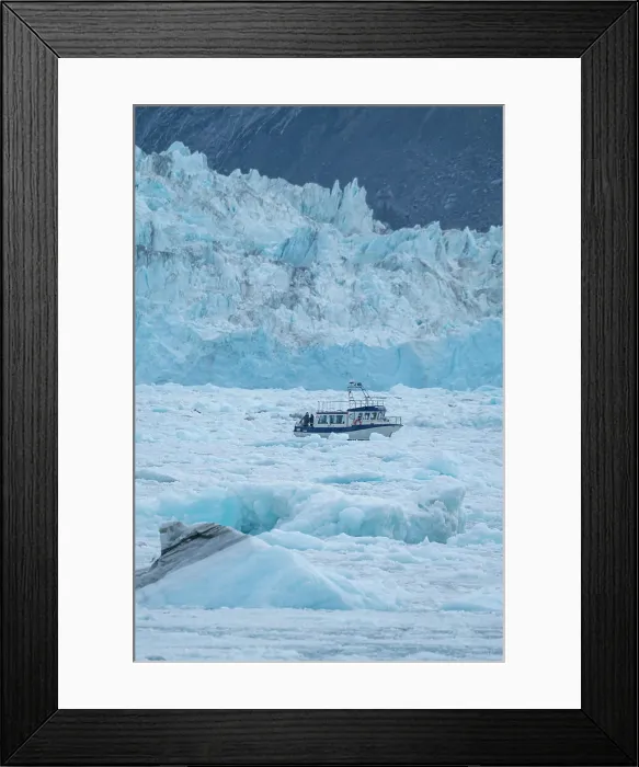 Framed Print : Little ship floating between the ice below the Eqi glacier, Western Greenland, Denmark, Polar Regions Framed Print : Little ship floating between the ice below the Eqi glacier, Western Greenland, Denmark, Polar Regions