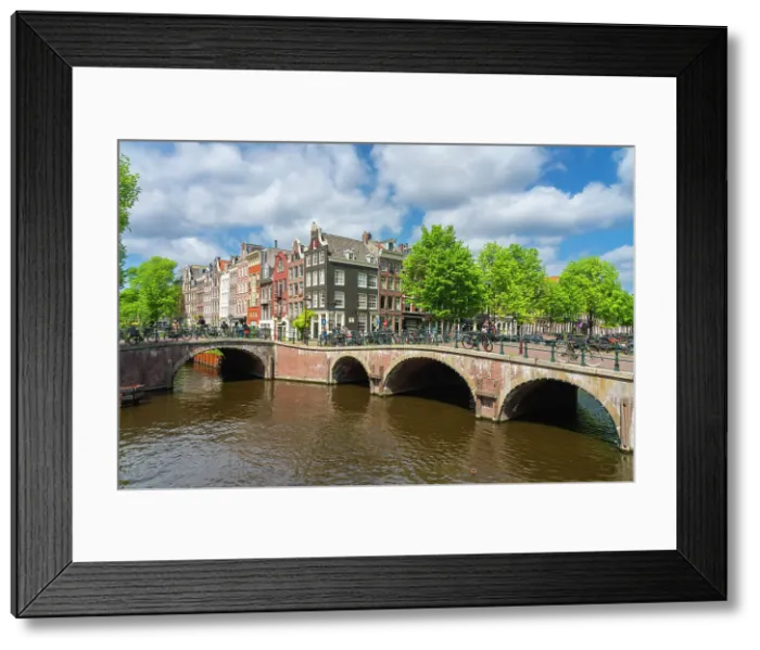 Framed Print : Bridges at intersection of Leliegracht and Keizersgracht canals, Amsterdam, The Netherlands, Europe Framed Print : Bridges at intersection of Leliegracht and Keizersgracht canals, Amsterdam, The Netherlands, Europe