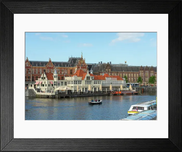 Framed Print : Boat on canal in front of Amsterdam Central Train Station, Amsterdam, The Netherlands, Europe Framed Print : Boat on canal in front of Amsterdam Central Train Station, Amsterdam, The Netherlands, Europe