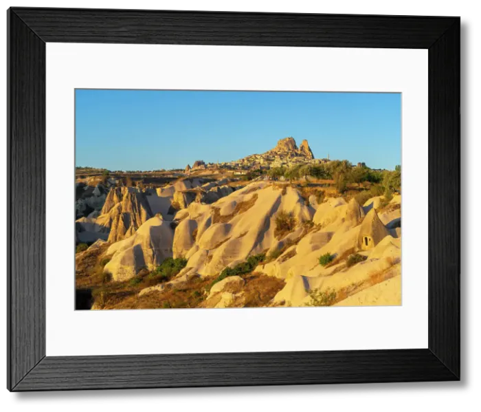 Framed Print : Rock formations with distant views of Uchisar Castle at sunrise, Goreme, Cappadocia, Anatolia, Turkey, Asia Minor, Asia Framed Print : Rock formations with distant views of Uchisar Castle at sunrise, Goreme, Cappadocia, Anatolia, Turkey, Asia Minor, Asia