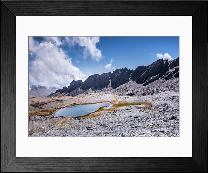 Framed Print : Dramatic rugged mountain range with a lake, Laguna del Rio Secco and Pico del Pulpito, Sierra Nevada, Andalusia, Spain, Europe