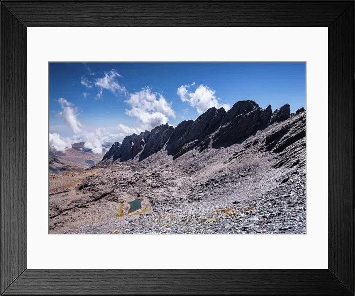 Framed Print : Dramatic rugged mountain range with a lake, Laguna del Rio Secco and Pico del Pulpito, Sierra Nevada, Andalusia, Spain, Europe