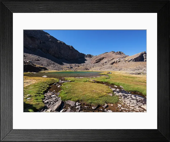 Framed Print : Mountain lake, Laguna Larga, at the foot of Mulhacen, Spain's highest mountain in the Sierra Nevada, Andalusia, Spain, Europe Framed Print : Mountain lake, Laguna Larga, at the foot of Mulhacen, Spain's highest mountain in the Sierra Nevada, Andalusia, Spain, Europe