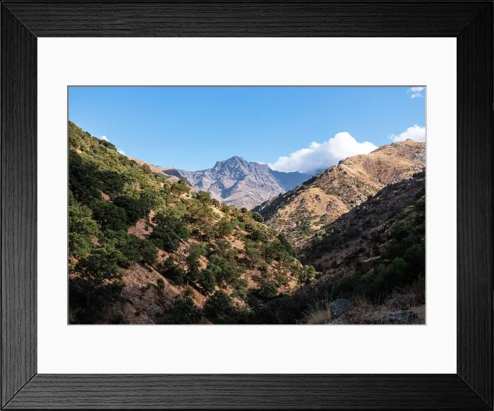 Framed Print : Hiking trail along rugged arid mountain valley of the Sierra Nevada, with Alcazaba in the distance, Andalusia, Spain, Europe Framed Print : Hiking trail along rugged arid mountain valley of the Sierra Nevada, with Alcazaba in the distance, Andalusia, Spain, Europe