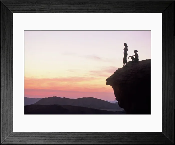 Framed Print : Two women sitting on a rock enjoying sunset in the desert of Wadi Rum, Jordan, Middle East Framed Print : Two women sitting on a rock enjoying sunset in the desert of Wadi Rum, Jordan, Middle East