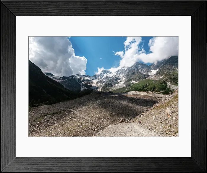 Framed Print : Hiking trail in alpine landscape facing Monte Rosa with moraine landscape, Italian Alps, Italy, Europe Framed Print : Hiking trail in alpine landscape facing Monte Rosa with moraine landscape, Italian Alps, Italy, Europe