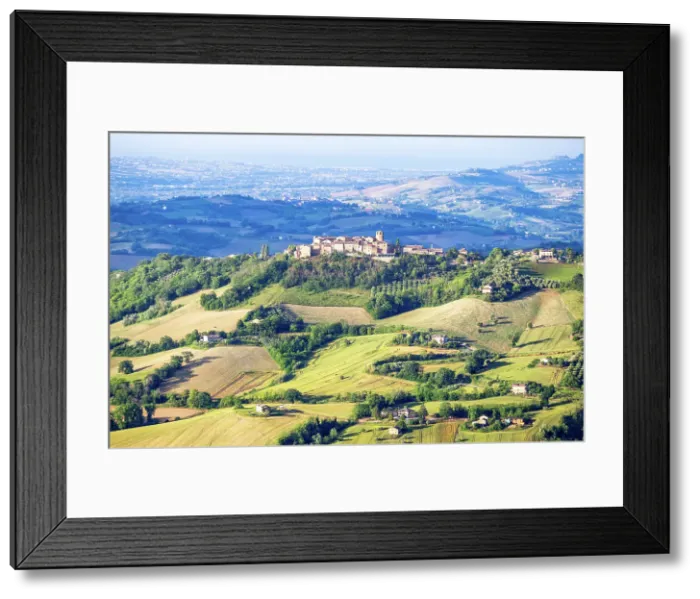 Framed Print : View towards hilltop village of Monteleone di Fermo and the surrounding countryside, Marche, Italy Framed Print : View towards hilltop village of Monteleone di Fermo and the surrounding countryside, Marche, Italy