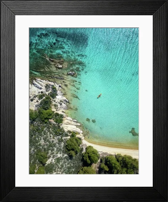 Framed Print : Diaporos island with wild beaches and kayak on the turquoise water, drone top aerial view, Chalkidiki, Greece Framed Print : Diaporos island with wild beaches and kayak on the turquoise water, drone top aerial view, Chalkidiki, Greece