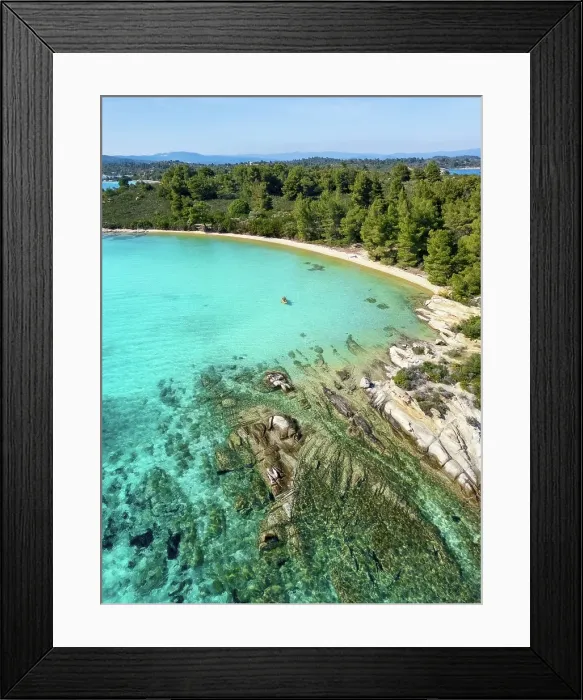 Framed Print : Diaporos island with wild beaches and a kayak on the turquoise water, drone aerial view, Chalkidiki, Greece Framed Print : Diaporos island with wild beaches and a kayak on the turquoise water, drone aerial view, Chalkidiki, Greece