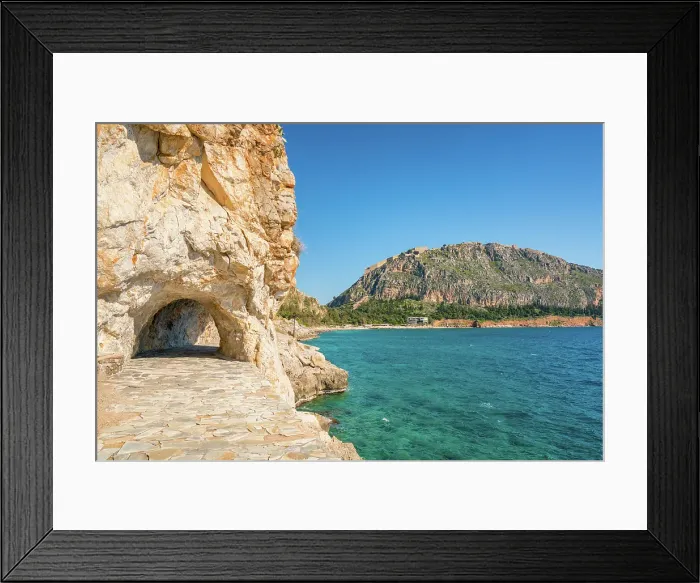 Framed Print : Arvanitias beach in historic city of Nafplion with Palamidi fortress on top of the mountain, Nafplion, Peloponnese, Greece Framed Print : Arvanitias beach in historic city of Nafplion with Palamidi fortress on top of the mountain, Nafplion, Peloponnese, Greece