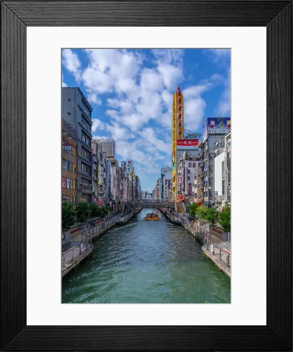 Framed Print : View of restaurants and tour boat in Dotonbori, vibrant entertainment district near the river, Osaka, Honshu, Japan