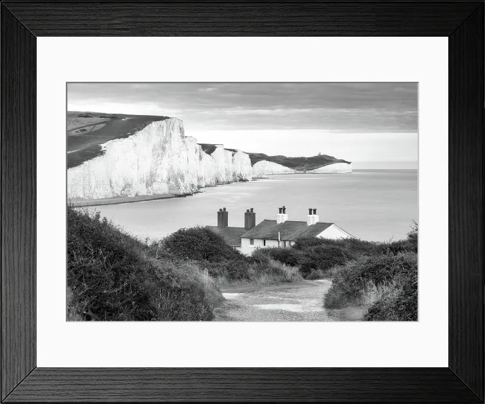 Framed Print : Coastguard cottages at Cuckmere Haven, and Seven Sisters cliffs beyond, South Downs National Park, Seaford, East Sussex, England, United Kingdom Framed Print : Coastguard cottages at Cuckmere Haven, and Seven Sisters cliffs beyond, South Downs National Park, Seaford, East Sussex, England, United Kingdom