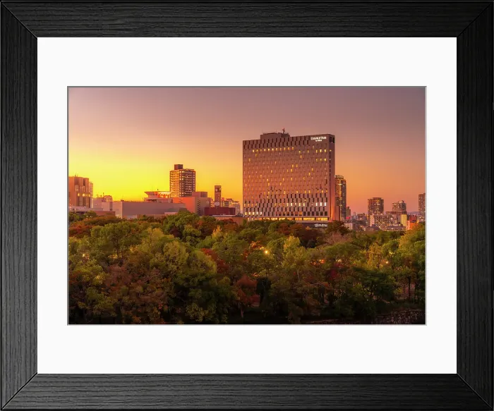 Framed Print : View of Osaka skyline from Osaka Castle at sunset, Osakajo, Chuo Ward, Osaka, Honshu, Japan Framed Print : View of Osaka skyline from Osaka Castle at sunset, Osakajo, Chuo Ward, Osaka, Honshu, Japan