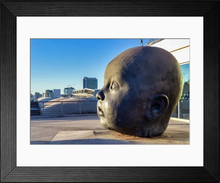 Framed Print : Giant Child Statue Head Titled Day, Atocha Train Station, Madrid, Spain