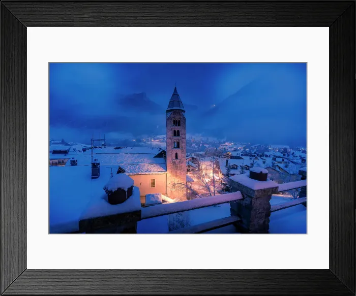 Framed Print : Church of Saint Pantalon and snow covered town centre and mountainous background in winter at dusk, Courmayeur, Aosta Valley, Italian Alps, Italy Framed Print : Church of Saint Pantalon and snow covered town centre and mountainous background in winter at dusk, Courmayeur, Aosta Valley, Italian Alps, Italy