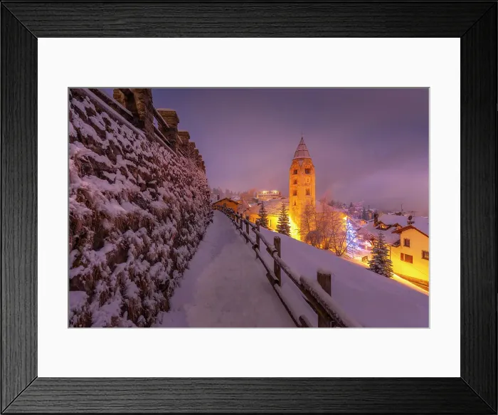 Framed Print : Church of Saint Pantalon and snow covered town centre and mountainous background in winter at dusk, Courmayeur, Aosta Valley, Italian Alps, Italy Framed Print : Church of Saint Pantalon and snow covered town centre and mountainous background in winter at dusk, Courmayeur, Aosta Valley, Italian Alps, Italy